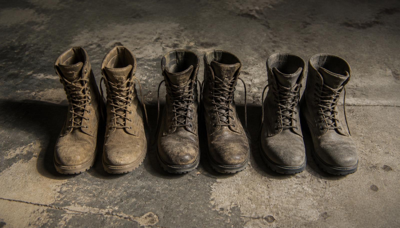 Two pairs of military combat boots side by side